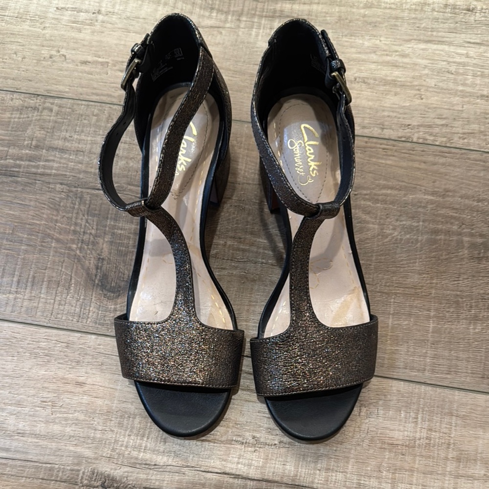 Clarks Women's metallic bronze.